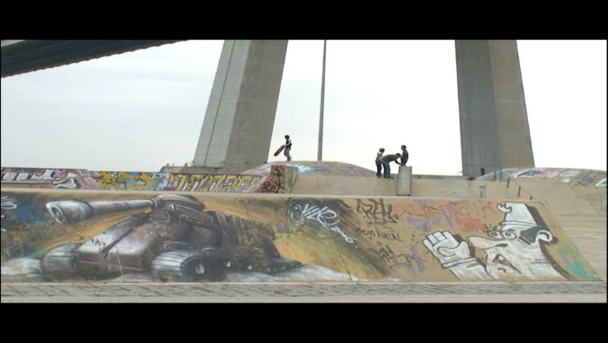 Young skateboarders and bikers in the park