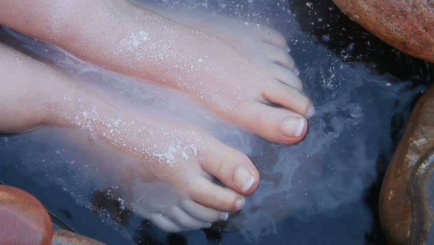 Aromatic, therapeutic powder sprinkled on feet adds to natural, outdoor spa relaxation and pleasure.