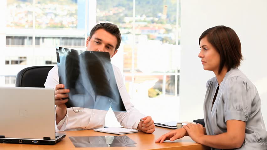 Meeting between a doctor and his patient at the hospital