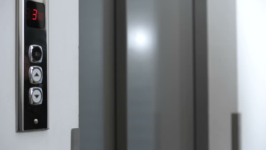 Woman entering lift; HD Photo JPEG