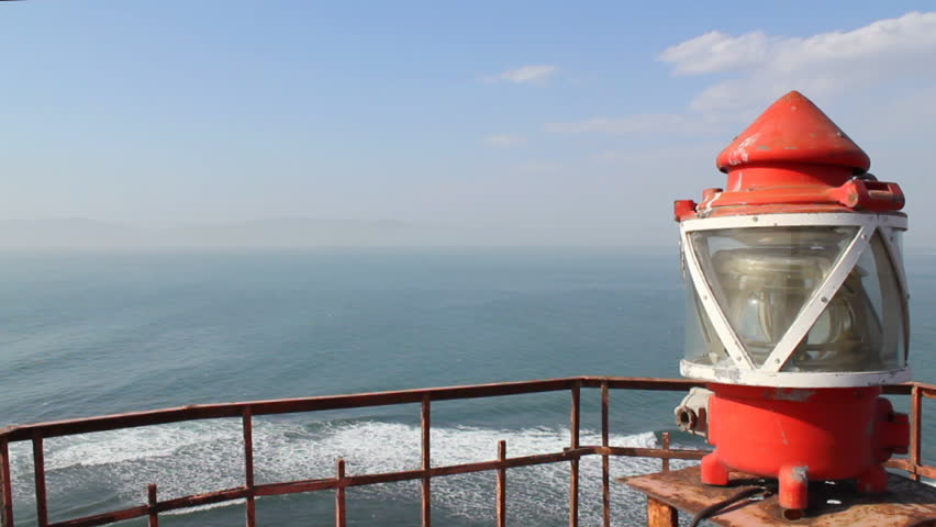 light beacon on the background of stormy sea