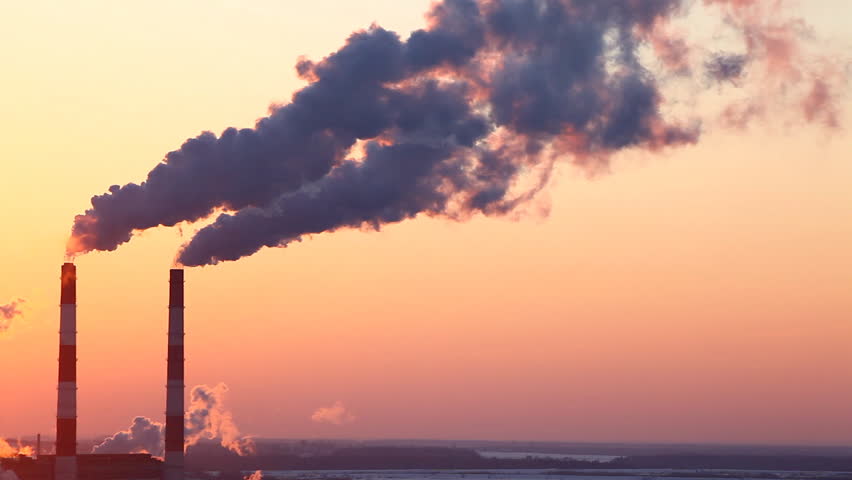 tube with smoke at winter sunset