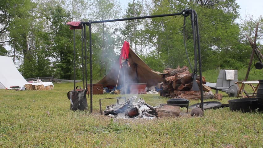 Cooking Fire Steadily Burning At A Historical Reenactment Campsite