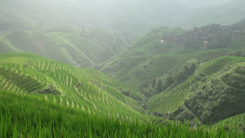Time lapse of village and rice terraces in Guangxi province.