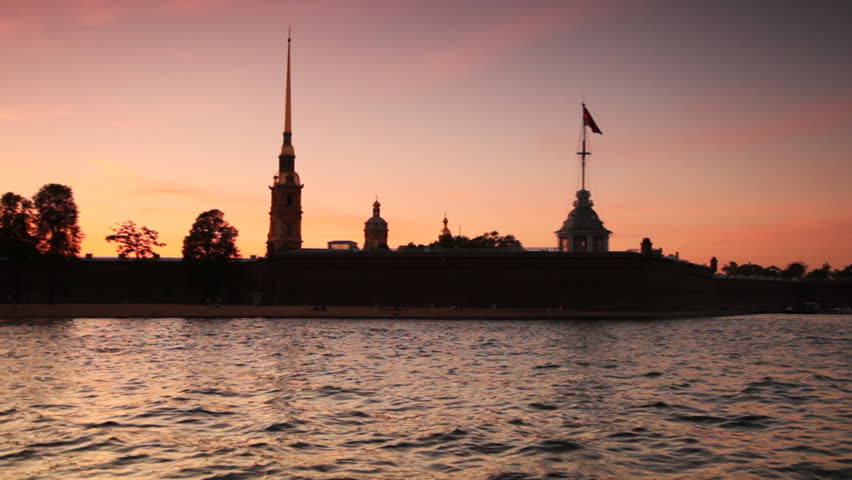 Petropavlovskaya Fortress on bank of Neva in white nights, St. Petersburg, Russia, shooting from floating ship
