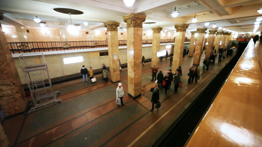 revival of passengers on subway and train arrives right side at station Komsomolskaya Moscow Metro