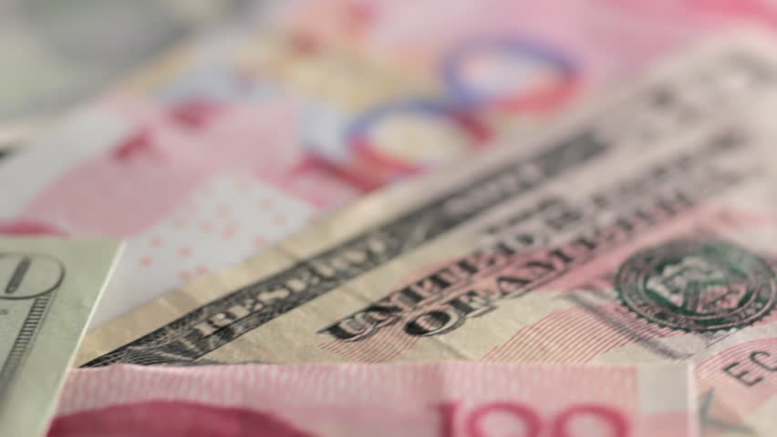Loop of various currency notes: dollars, euros, yuan, yen and sterling