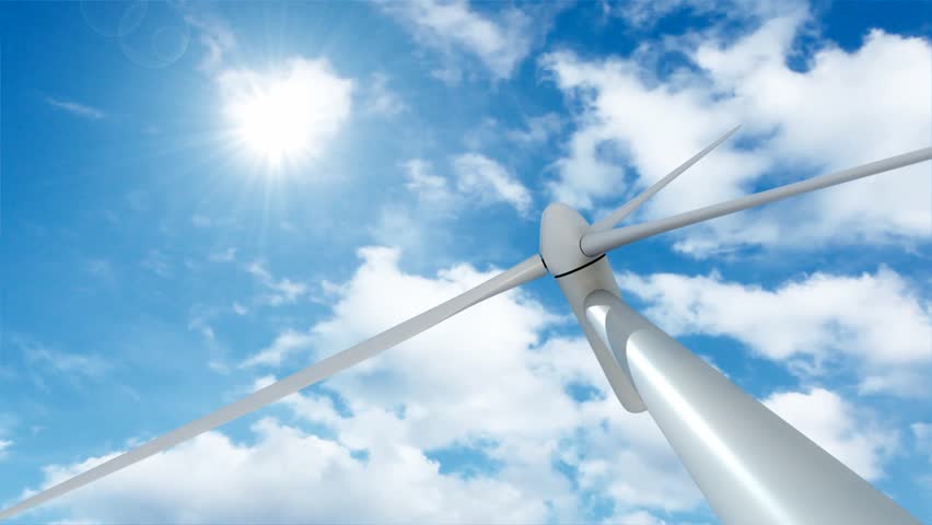 Bottom view of power generator Windmill under time lapse moving clouds