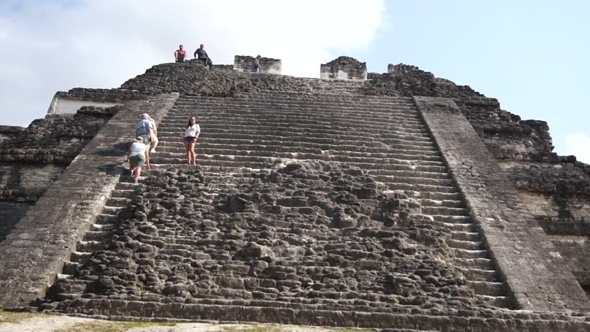 People on the pyramid in Tikal, Guatemala