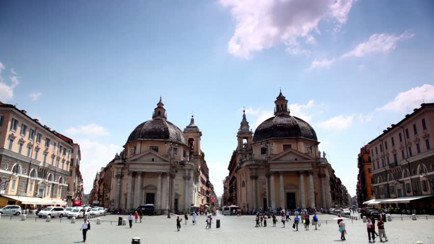 Symmetrically arranged edifices of Santa Maria in Montesanto on  Piazza del Popolo, the streets between them and on each side