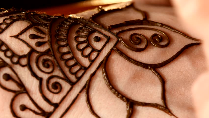 woman hand decorated with henna tattoo mehendi on black woman hand decorated with henna tattoo mehendi on black