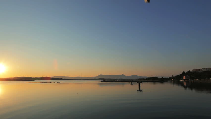 Landing of airplane, sunset scene, Corfu airport, Greece