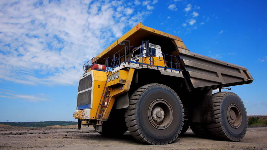 Mining dump trucks in the open pit mine