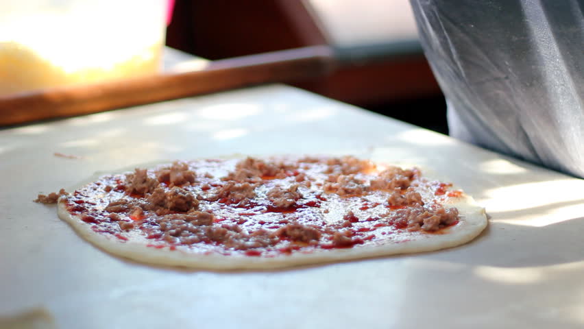 Chef preparing a pizza.HD 1080i.