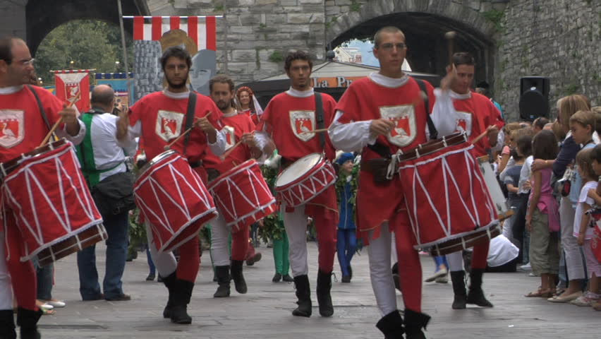 Como, Italy - September 2011: Palio del Baradello. Drummers and flag twirlers dressed in traditional medieval costumes,