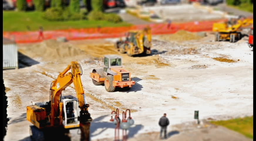 Timelapse construction ground with heavy machinery 