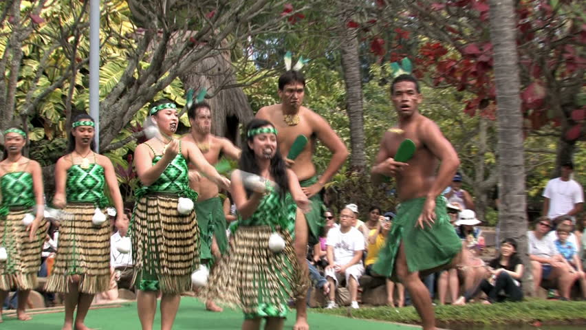 Polynesian Cultural Center, Oahu, Hawaii. Students from Brigham Young University putting on shows and demonstrations. Boat or canoe representing New Zealand culture with dancers. Editorial use. 