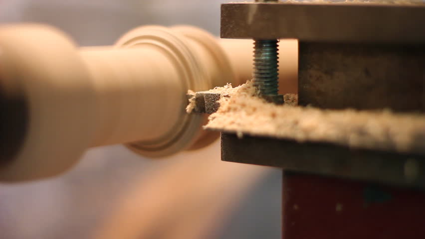 Carpenter scrape on the lathe a piece of furniture