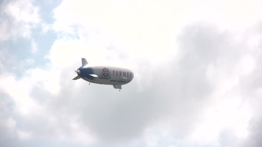 FORT LAUDERDALE, USA - MAY 20: Airship Eurika visits South Florida on a nationwide tour. The zeppelin bears the name of Farmers Insurance as a sponsor on May 20, 2011 near Fort Lauderdale, FL