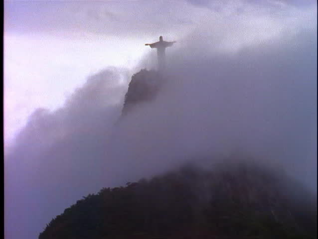 Fog rolls over the Christ The Redeemer statue in Rio De Janeiro.