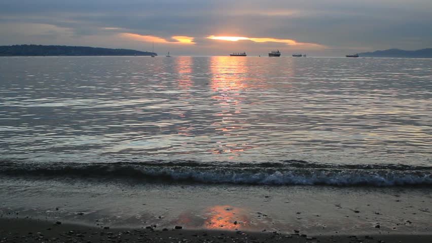Sunset Beach in Vancouver BC Canada with Water Reflection 1080p panning