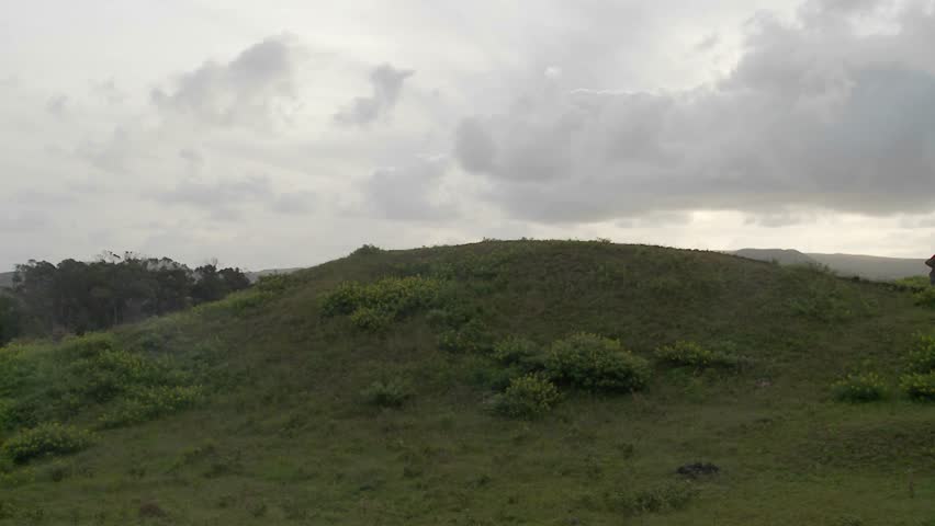 A panning shot reveals the unfinished statues on Easter Island.