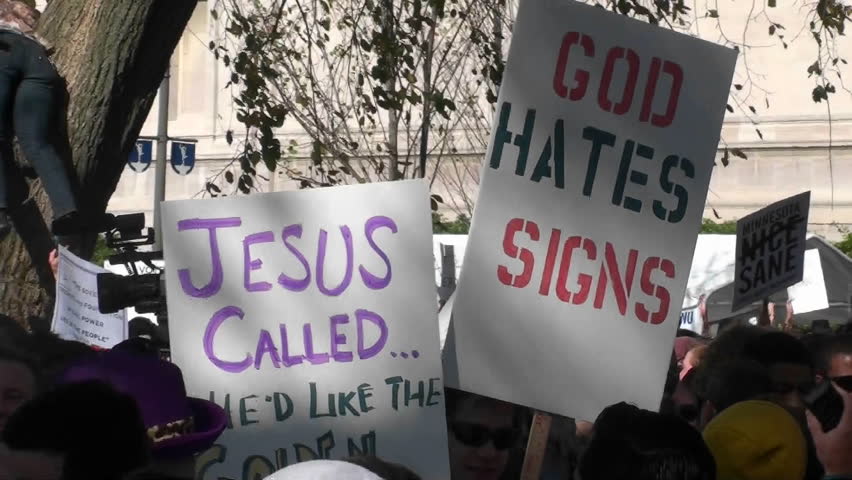 WASHINGTON, DC - CIRCA 2010: Large crowds gather on the Washington D.C. mall during a political protest with ironic signs circa 2010 in Washington DC.