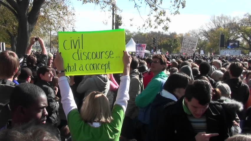 WASHINGTON, DC - CIRCA 2010: Large crowds gather on the Washington D.C. mall during a political protest with ironic signs circa 2010 in Washington DC.