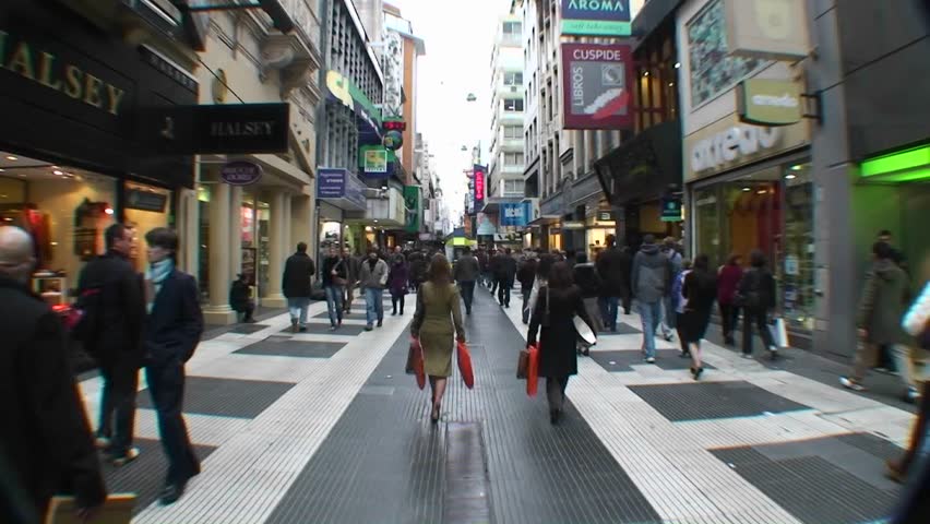 BUENOS AIRES, ARGENTINA - CIRCA 2009: Shoppers walk down a crowded busy street circa 2009 in Buenos Aires, Argentina.