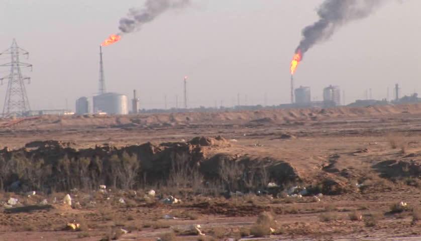 Burning extraction wells in an oil or natural gas field in Iran.