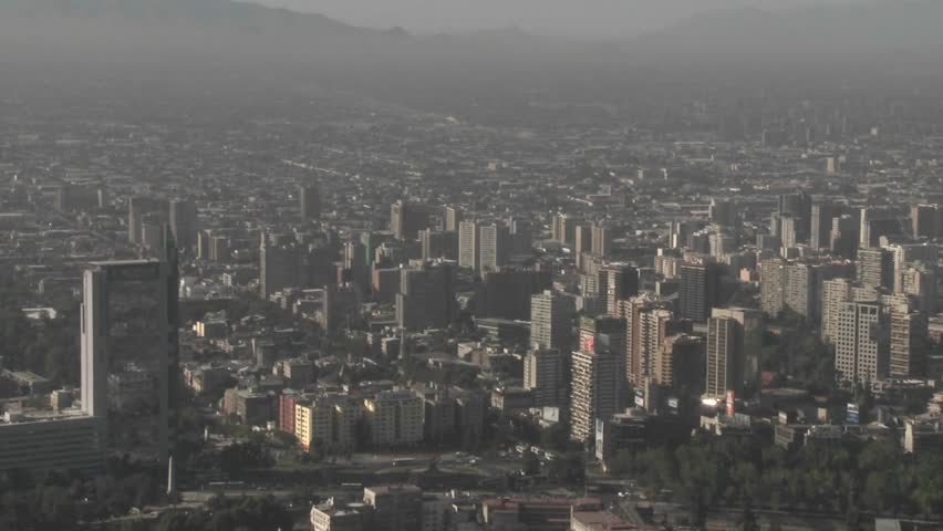 Pan across the smog filled city of Santiago, Chile.