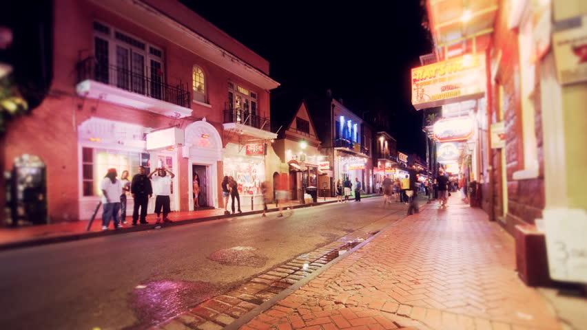 NEW ORLEANS - CIRCA 2010: (Timelapse View) People walking down Bourbon Street, circa 2010 in New Orleans, LA. 