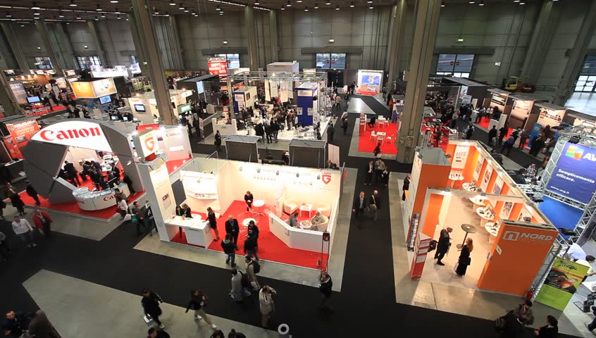MILAN, ITALY - OCT 19: People visit stands during SMAU, international fair of business intelligence and information technology October 19, 2011 in Milan, Italy. 