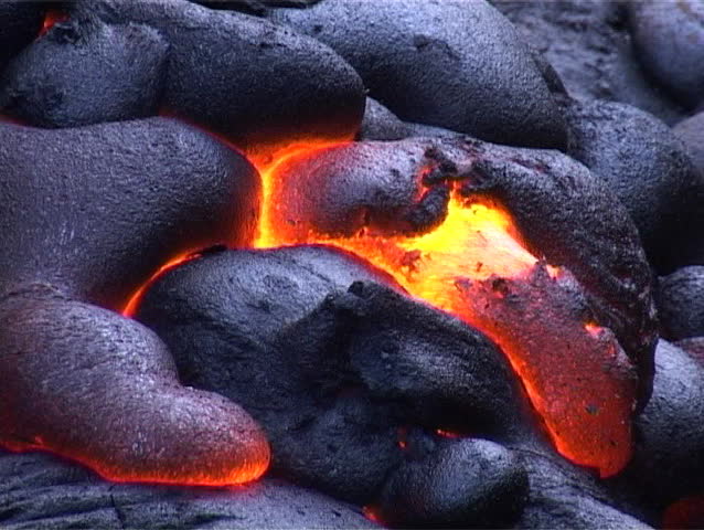 Cooling crust shows fiery hot molten lava underneath.