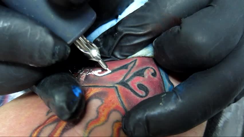 Tattooing with white ink