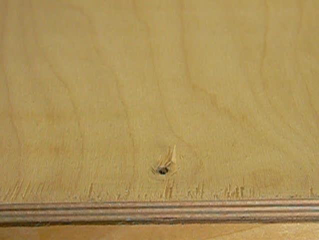 closing plywood cover with wood-screw and electrical screwdriver