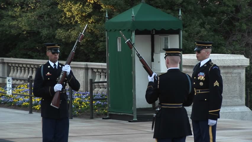 WASHINGTON, D.C. - CIRCA 2009: Three soldiers guard the tomb of the unknown soldier.