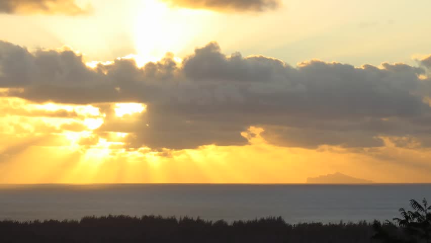 Time Lapse Sunbeams  at Sunset, Bora Bora, French Polynesia (Maupiti in Background)