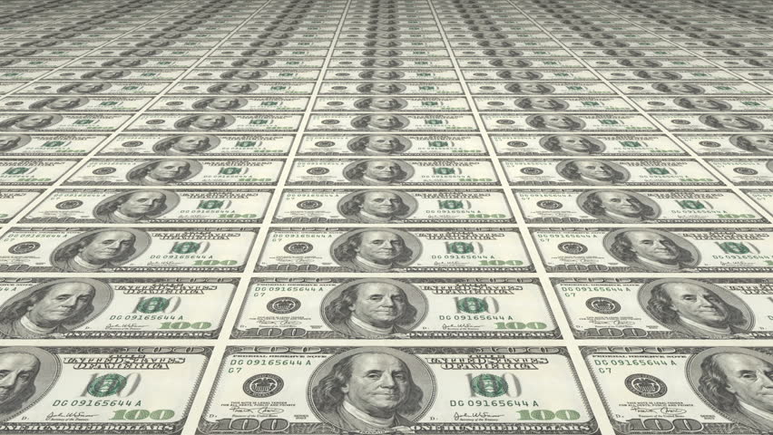 Large sheet uncut American 100 Dollar bills diminishing into the distance.