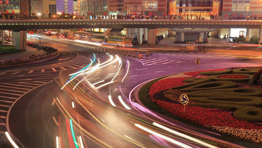 Cityscape timelapse at night. traffic through downtown in Shanghai, China.