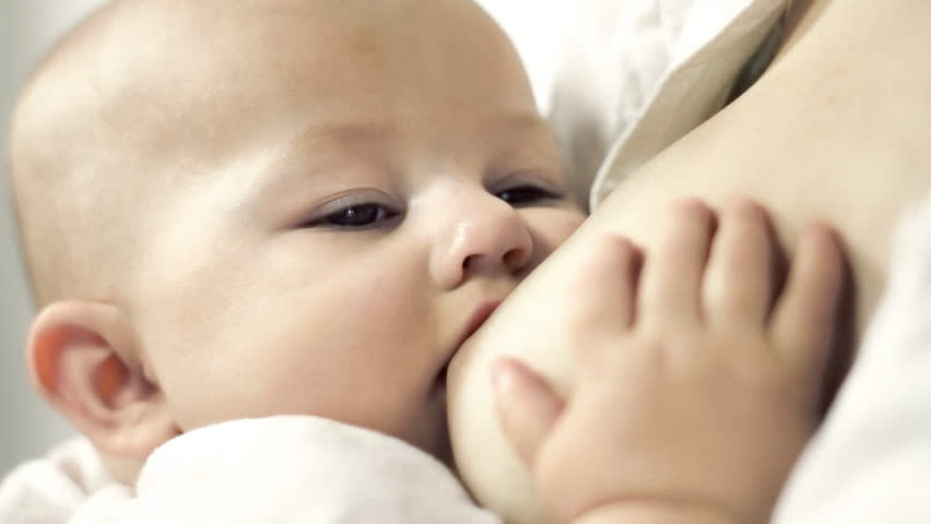 Breastfeeding a cute baby. Lactescent. A close-up shot taken with Canon 7D camera. Shallow depth of field. High key. HD 1080 25p
Clip ID: Breastfeeding3_HD