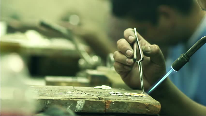 goldsmith welding silver pieces