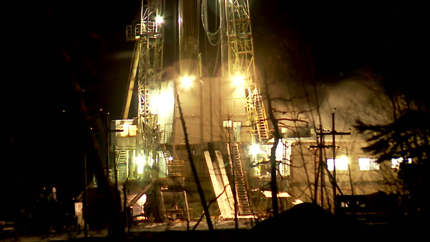 drilling rig at night in winter