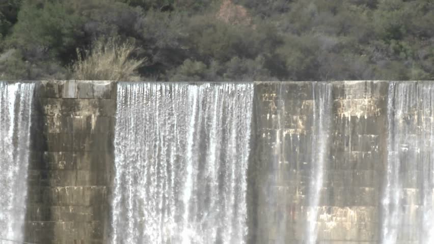 Zoom out of water spilling over the Matilija Dam after a rain in Ojai, California.