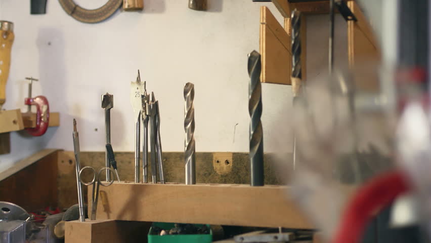 Screwdrivers, rasp, utensils, equipment and work tools in carpentry workshop
