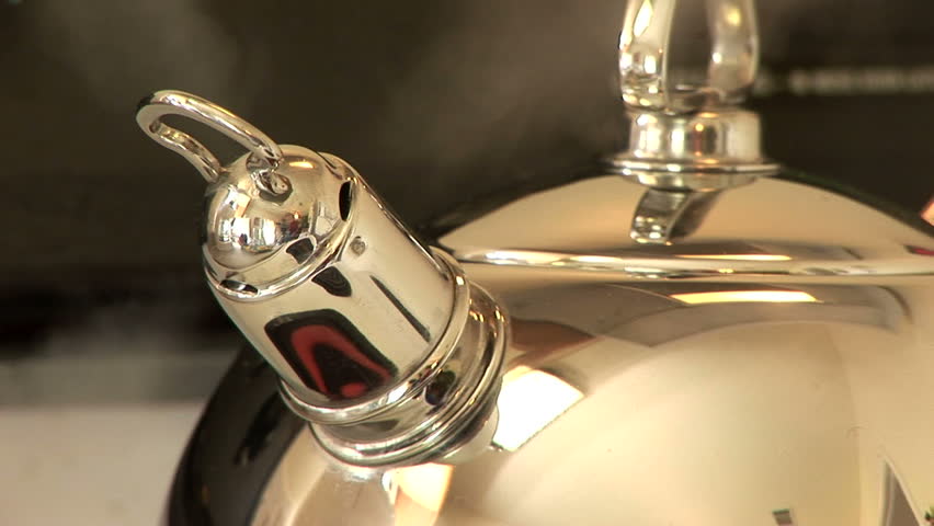 steam escaping from a whistling tea kettle