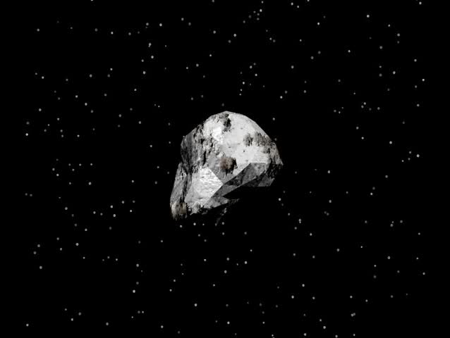 An asteroid or meteor flying through space heading for a collision with an earthlike planet.