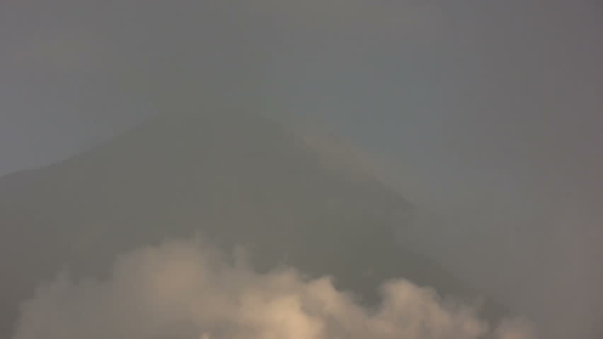 Clouds moving past the summit of Tungurahua Volcano, Ecuador