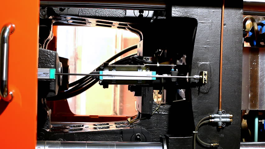 pan on plastic press molding machine during work