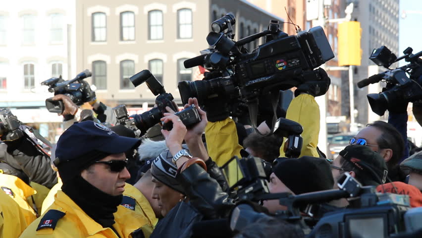 TORONTO, ONTARIO - NOV 23th: Media scrum at Occupy Toronto on Nov 23rd, 2011, Toronto, Ontario, Canada. The site was closed down on Nov 23rd by police following a superior court judge ruling.